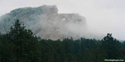Crazy Horse Monument appears mysterious in fog..